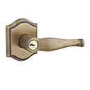 Baldwin Reserve ENDECTAR049 Entry Left Hand Decorative Lever and Traditional Arch Rose with 6AL Latch and Dual Strike Matte Brass and Black Finish - Left Hand - Brass